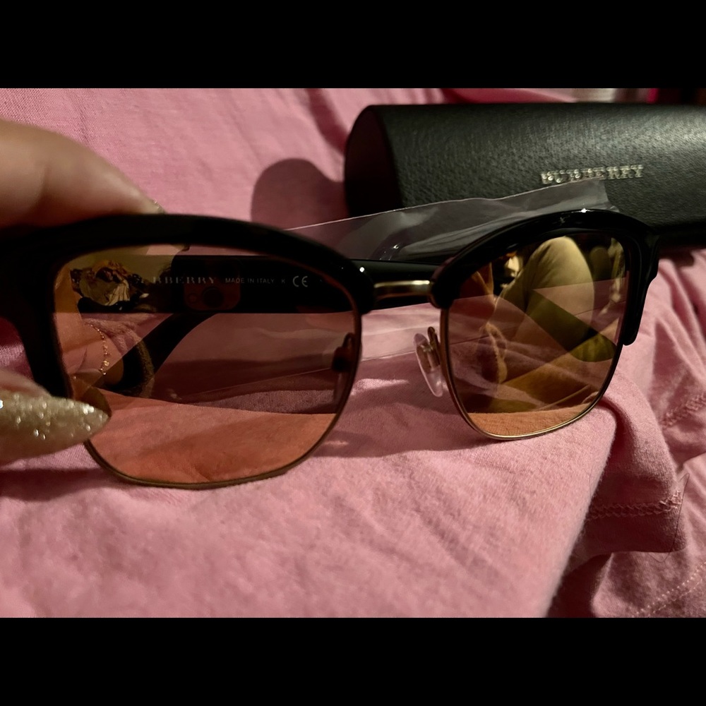 Burberry sunglasses. Gold reflect